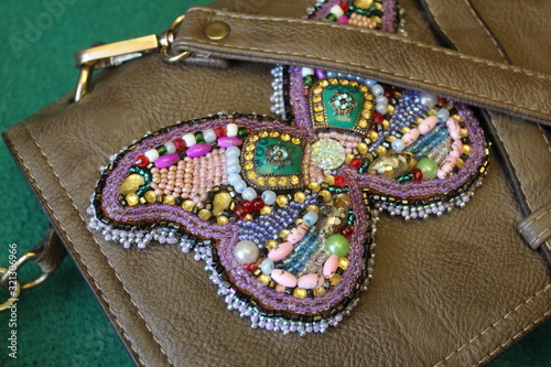 It is fashionable to wear brooches on clothes, on bags - everywhere
