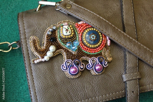 It is fashionable to wear brooches on clothes, on bags - everywhere