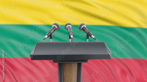 Podium lectern with microphones and Lithuanian Flag in background