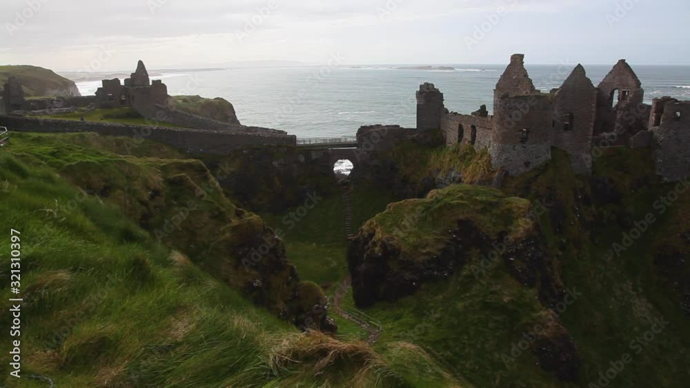 Wide, castle ruins on Ireland coast Wide, castle ruins on Ireland coast
