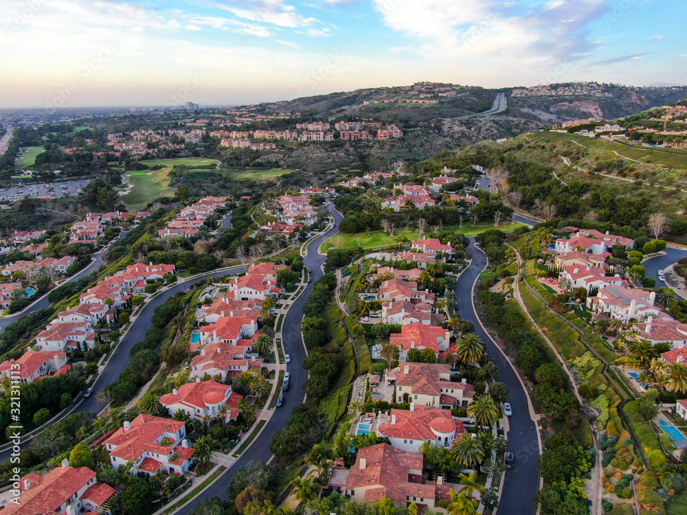  Crystal Cove neighborhood community in the Newport coast before sunset. Luxury big villa with pool on the cove.