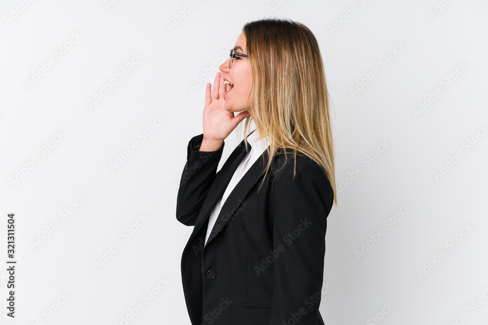 Young business caucasian woman shouting and holding palm near opened mouth. Young business caucasian woman shouting and holding palm near opened mouth.