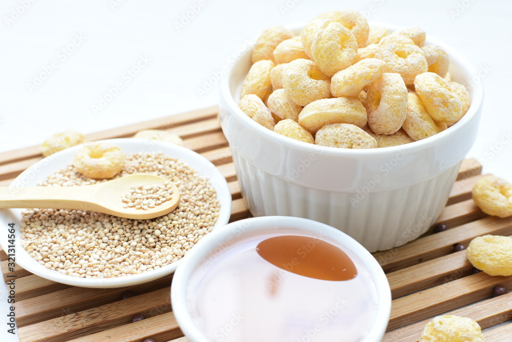 Quinoa cereal, accompanied by seeds and honey Quinoa cereal, accompanied by seeds and honey