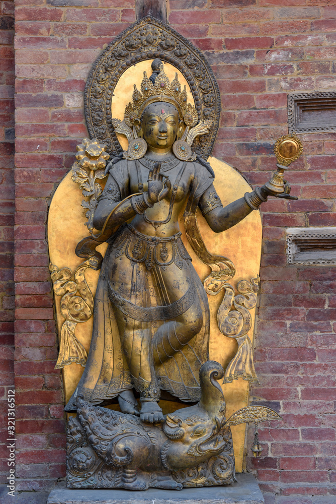 Golden statue of the temple at Durban square on Patan near Kathmandu, Nepal