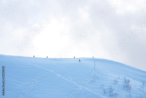 mountain ski resort Rosa Khutor in Sochi. Winter sunny day with cloudy .