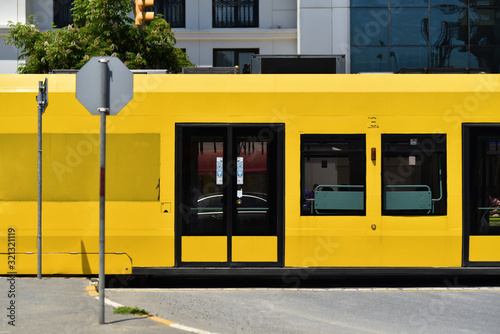 yellow wagons of ground metro in downtown
