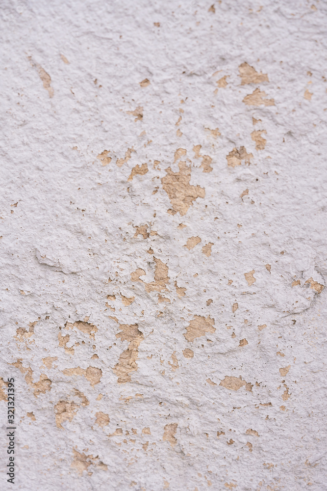 Old white and yellow plaster shell rock wall texture background. Top view Old white and yellow plaster shell rock wall texture background. Top view