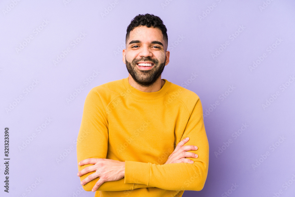 Young mixed race arabic man isolated laughing and having fun. Stock Photo Adobe Stock
