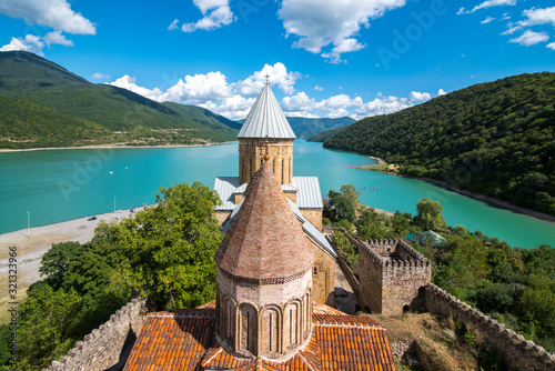 Tela Ananuri in Georgia, fortress with orthodox monastery and reservoir on a hill ove