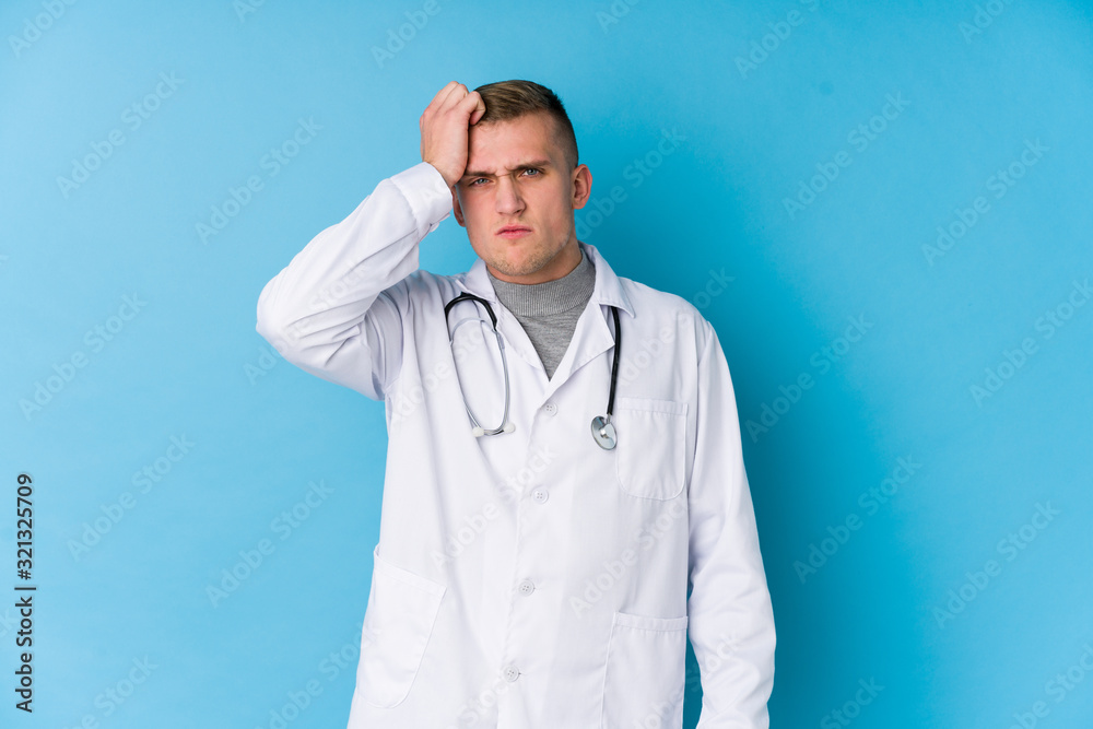 Young caucasian doctor man being shocked, she has remembered important meeting. Young caucasian doctor man being shocked, she has remembered important meeting.