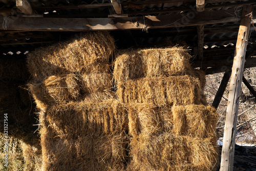 Bales of hay stacked on each other, agricultural background
