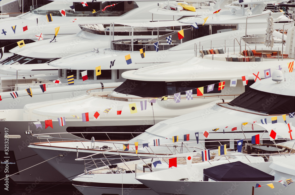 Fototapeta premium Sailing yachts and motor-boats off the Côte d'Azur coast in the saint raphael gulf, South of France, Europe