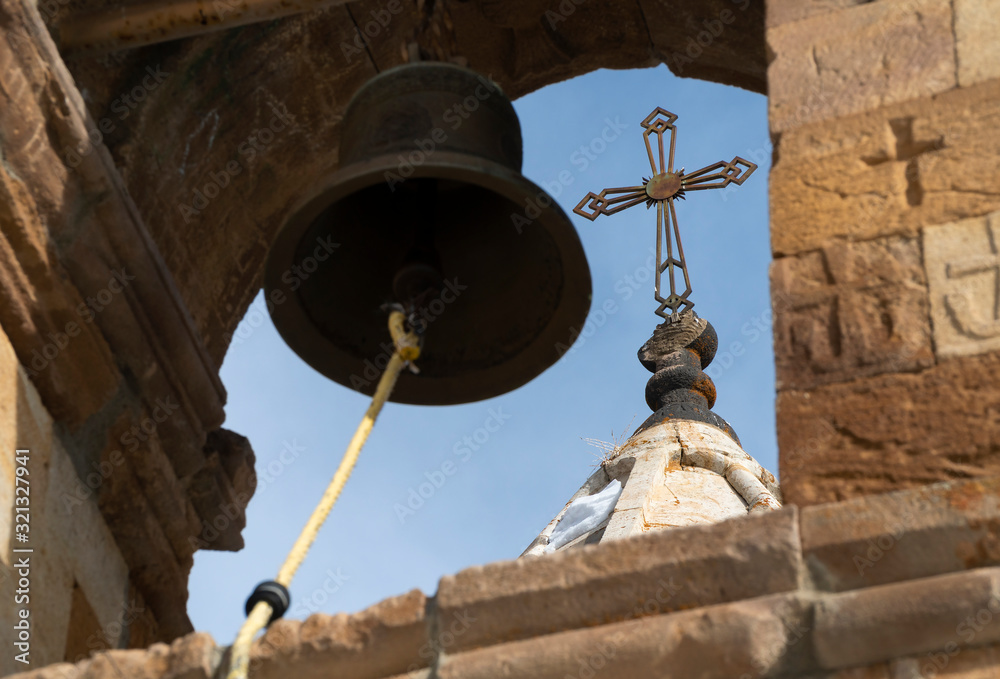 church bell with the cross.
