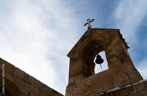 Church bell with the cross.