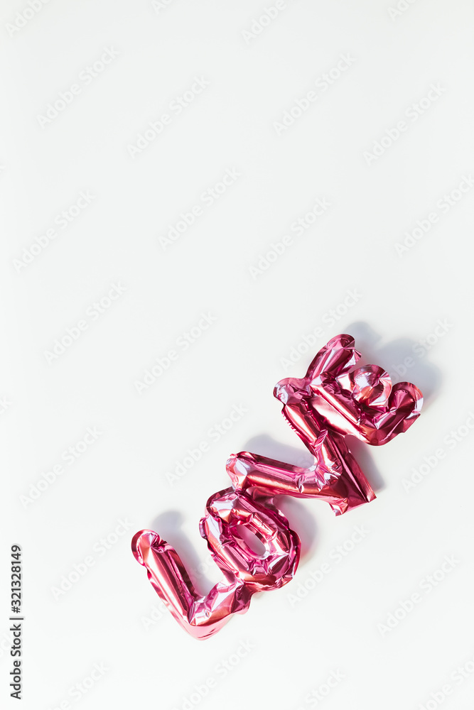 Love concept. Inflatable pink balloon with letters Love concept. Inflatable pink balloon with letters