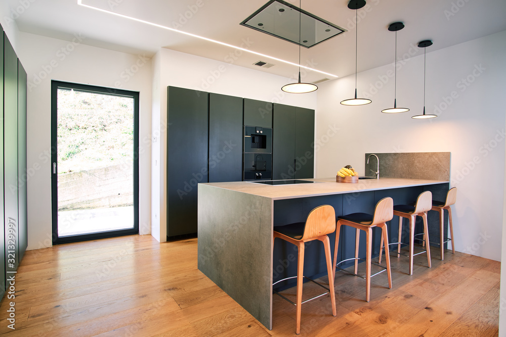 Modern kitchen with counter and chairs - obrazy, fototapety, plakaty 