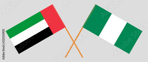 Crossed flags of Nigeria and the United Arab Emirates