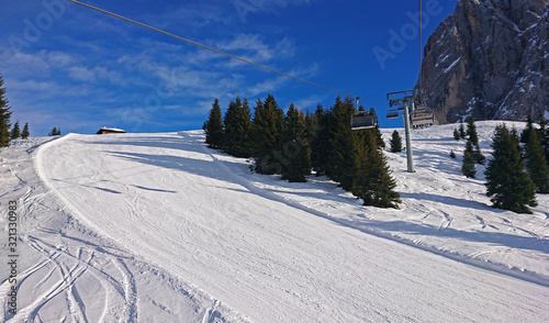 Empty ski slope in the Dolomites skiing area in South Tirol, Italy