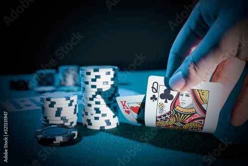 Man plays poker in the casino