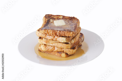 stack of french toast breakfast food on plate with syrup, isolated on white background.