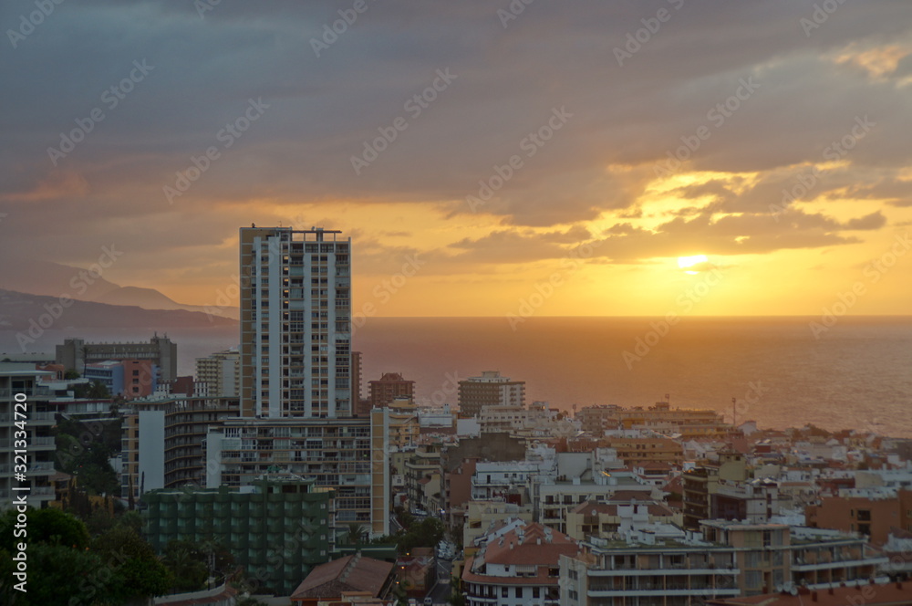  picturesque sunset on the Spanish island of Tenerife in the city of Puerto de la Cruz