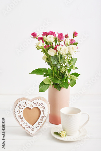 Spring card template. Happy Birthday or Valentine. Women's Day. Greeting card for mother's day. Congratulation with flowers. Flower card. Copy space. Romantic breakfast. Roses on white background