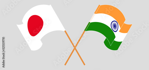 Crossed and waving flags of India and Japan