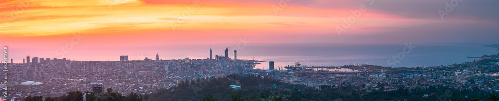 Obraz premium Batumi, Adjara, Georgia. Aerial View Of Urban Cityscape Skyline At Sunset. Georgian Black Sea Coast. Resort Town. Panorama, Panoramic View