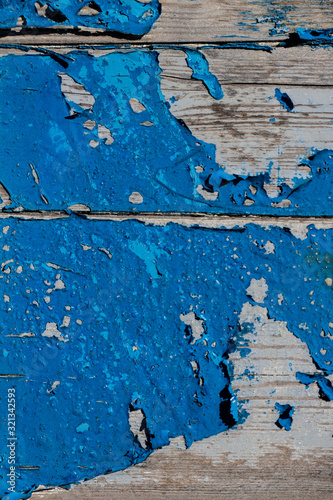 old wooden planks with weathered blue paint, old blue paint on wooden boards, traces of time, old wood texture traces of blue paint