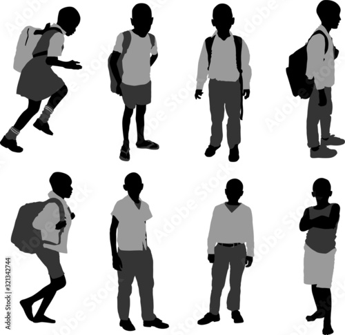 silhouette of poor black african school children from rural poverty areas walking, standing and running
