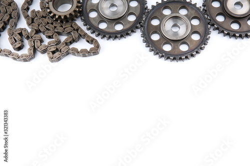 old gears and engine chain on a white background with copy space
