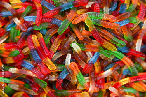 background of multi colored chewing sweets close up