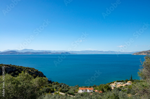 Relaxing colorful seascape with view on mountains of Peloponnese, Greece