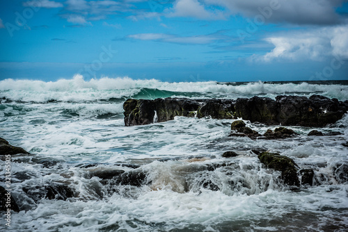 waves crashing on rocks