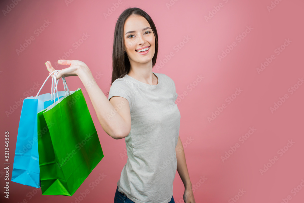 beautiful girl holding shopping bags