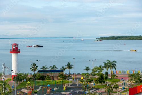 View of lighthouse and boats in the malecon of the city of Buenaventura.Valle del Cauca. Colombia, November 30, 2019 photo