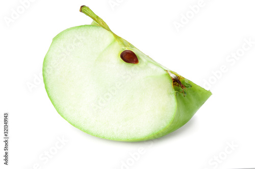 Green apple slice isolated on white background. cut of green apple