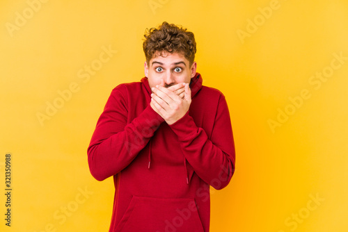 Photography shocked covering mouth with hands.