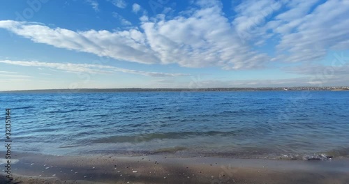 Blue sky with relaxing sea waves