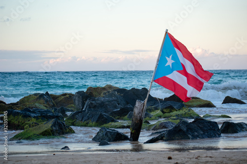 Puerto Rican Flag Blowing in the Wind at the Beach photo
