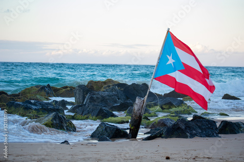 Puerto Rican Flag Blowing in the Wind at the Beach