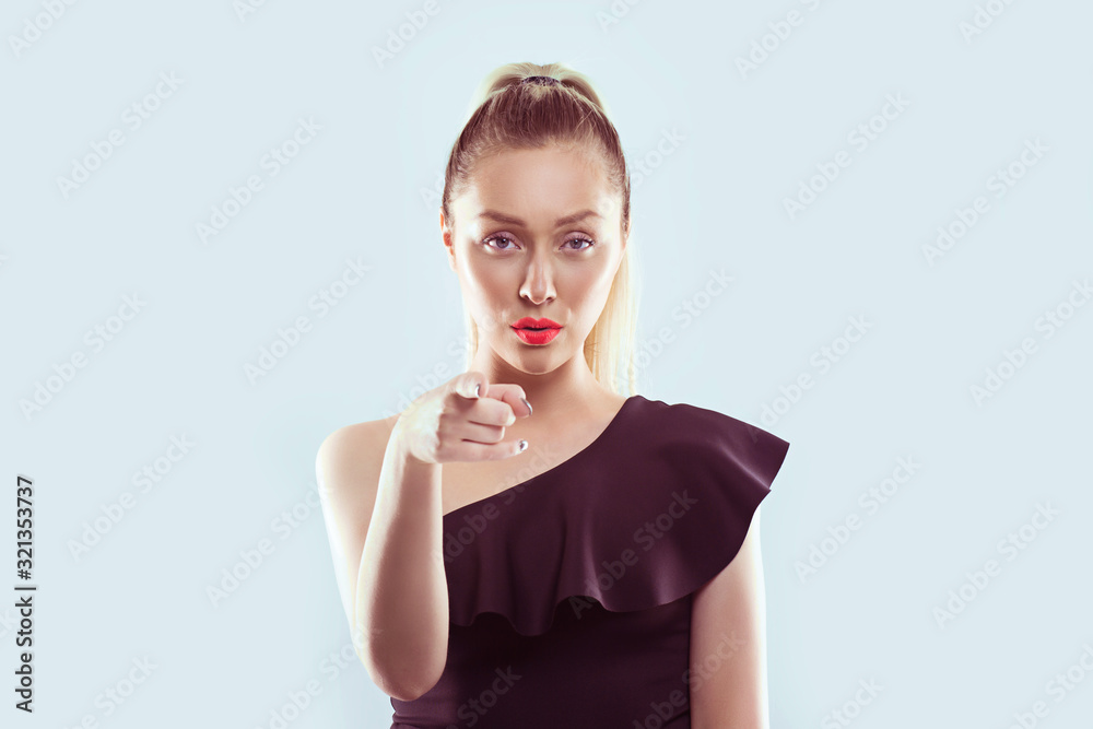 It's you! Portrait closeup woman pointing finger at you camera showing hand gesture this is you, you chosen isolated white light blue wall background. Human emotions face expressions It's you! Portrait closeup woman pointing finger at you camera showing hand gesture this is you, you chosen isolated white light blue wall background. Human emotions face expressions