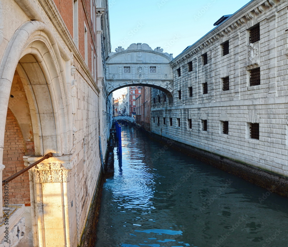 ‎VENICE, ITALY, January ‎13, ‎2020. Traditional canal street with gondolas and boats in Venice, Italy.