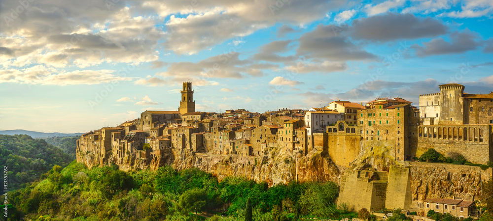 Tuscany, Pitigliano medieval village panorama at sunset. Italy