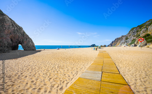 Adraga beach landscape and rock arch. Almocageme  Sintra  Portugal