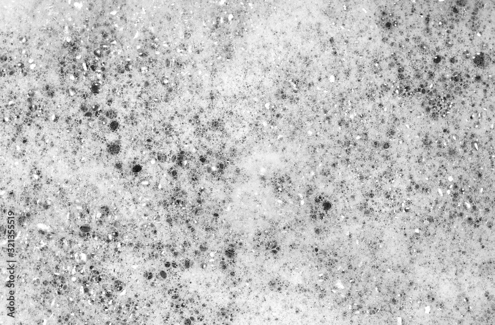 Obraz premium Foam bubble from soap or shampoo washing on top view. Foam background. White foam.