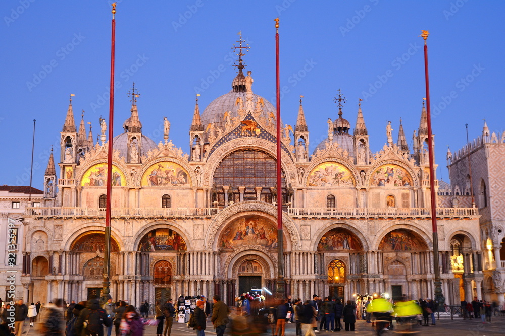 VENICE, ITALY, January,11/2020. Tourists in front of St Marks Cathedral (Basilica San Marco), Piazza San Marco, Venice, Veneto, Italy.
