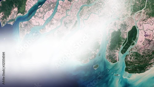 Fly over river delta with moving clouds, aerial satellite Irrawaddy river Myanmar. Images furnished by Nasa photo