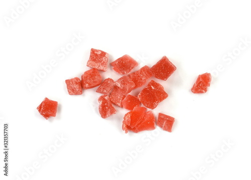 Candied red fruit. Candied papaya path isolated on white background.