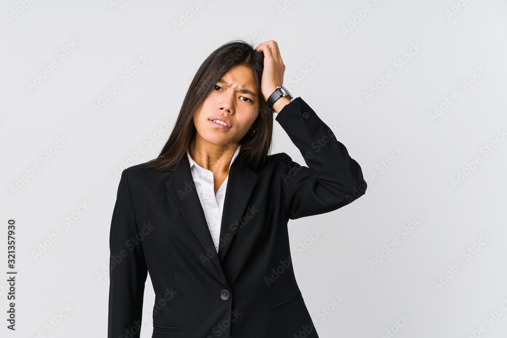 Young asian business woman tired and very sleepy keeping hand on head. Young asian business woman tired and very sleepy keeping hand on head.